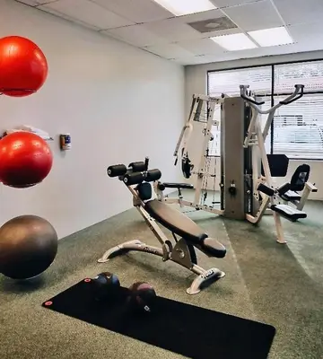 a person laying on the floor in a gym at Sea World Orlando Apts Parks Convention Centre in Orlando