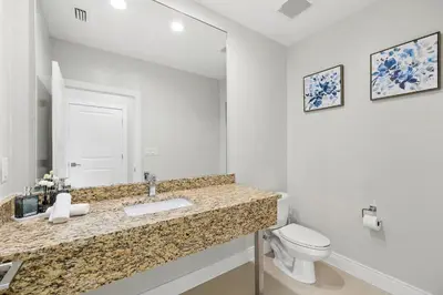 a bathroom with a sink and a toilet at Villa near Orlando's Attractions in Orlando