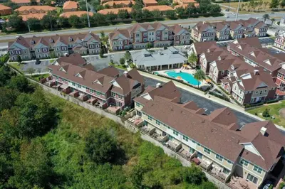 an aerial view of a large house with a pool at Perfect Home 5 Minutes from Disney 5BD 15P in Orlando