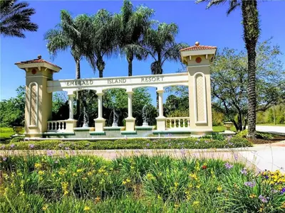 a gazebo in a park with palm trees at The Beauty at Emerald Island in Kissimmee