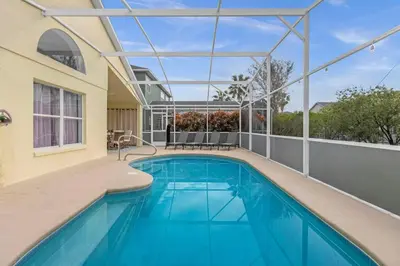 a swimming pool on the balcony of a house at Sunny Side Up in Orlando