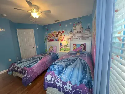 two beds in a room with a castle bedroom at Mickey's Castle by PropertyChekker! in Orlando