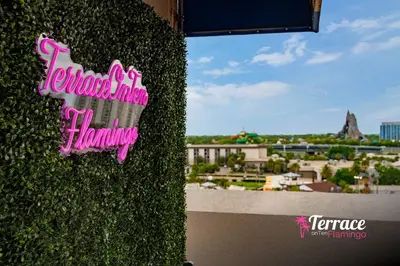 a sign on the side of a wall with a view at Gorgeous 2 Bed 2 Bath Flamingo Penthouse Volcano Bay View in Orlando