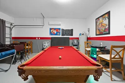 a room with a pool table in a classroom at Windsor Hills Fun 6BR Villa Pool Spa By Disney in Orlando