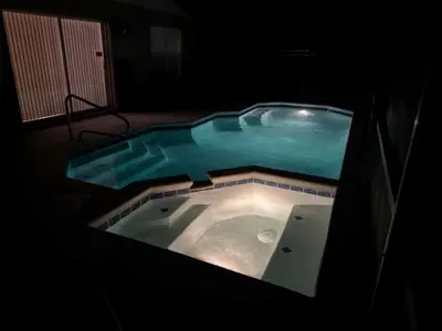 a jacuzzi tub in a dark room at Holiday Home Familien-Pool-Rückzug nur 2-5 Meilen von Disney entfernt by Interhome in Kissimmee