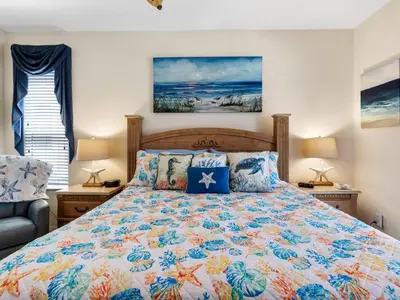 a bedroom with a bed with a colorful bedspread at Holiday Home Ferienvilla Magical Memories by Interhome in Kissimmee