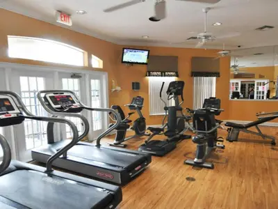 a gym with several exercise bikes in a room at Holiday Home 2696LIC by Interhome in Kissimmee