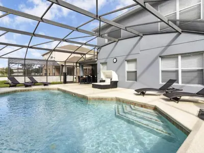 an image of a swimming pool with a glass roof at Holiday Home Seasons Retreat mit privatem Pool in der Nähe von Disney by Interhome in Kissimmee