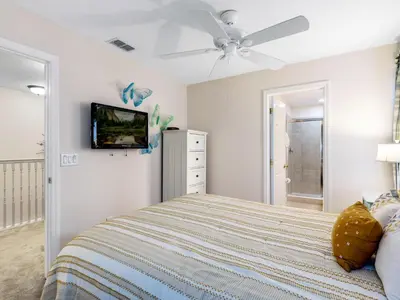 a bedroom with a bed and a ceiling fan at Holiday Home Florida Breeze mit Whirlpool by Interhome in Kissimmee