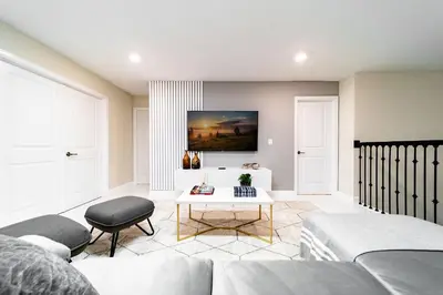 a living room with a couch and a table at Storey Lake Resort 9Q c/ Piscina & Game Room in Kissimmee