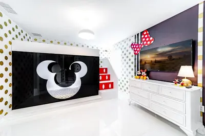 a childrens room with a large flat screen tv at Storey Lake Resort 9Q c/ Piscina & Game Room in Kissimmee