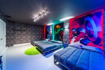 a bedroom with two beds and a brick wall at Storey Lake Resort 9Q c/ Piscina & Game Room in Kissimmee