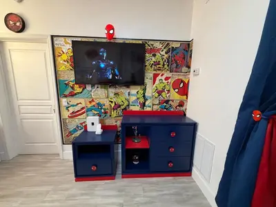 a room with a play set and a tv on a wall at Disney Princess and Heroes Apartment Accessible in Orlando