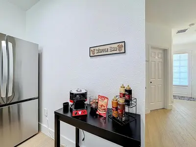 a kitchen with a counter with a coffee maker on it at The Roundup Retreat! in Orlando