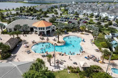 an aerial view of a pool at a resort at Lake view Near Disney Resort w Lazy River 108 in Kissimmee