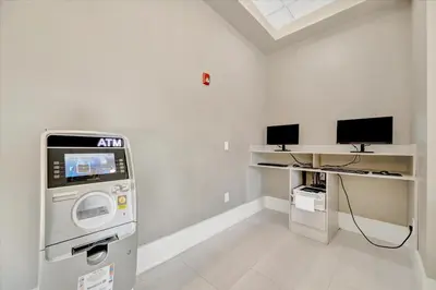 a white room with a machine in a room at Free Breakfast & Parking 2B Disney Resort Condo in Orlando