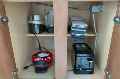 a kitchen with a coffee maker and a toaster on a shelf at Free Breakfast & Parking 2B Disney Resort Condo in Orlando