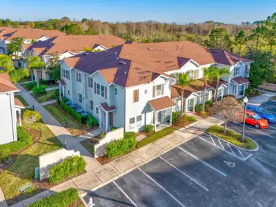 an overhead view of a house with a parking lot at Relaxing Resort Townhome Close to Disney in Kissimmee