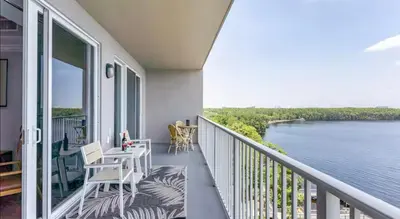 a balcony with a view of the water at Blue Heron Resort in Orlando