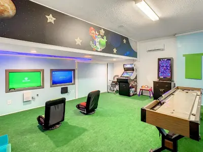 a room with a ping pong table and ping pong ball at 160 Minton Loop in Orlando