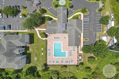 an aerial view of a house with a pool at 3176-205 Resort Pool Condo Apt near Disney in Kissimmee