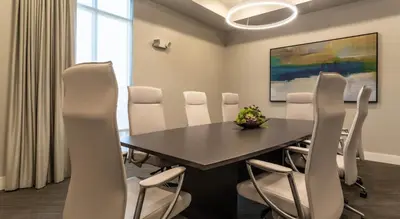 a conference room with a table and white chairs at Landing Stunning 1BD Gym Clubhouse in Orlando