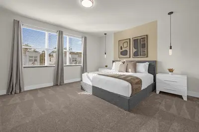 a bedroom with a large bed and a window at Luxury 4 Bedroom Family Getaway w Private Pool in Orlando