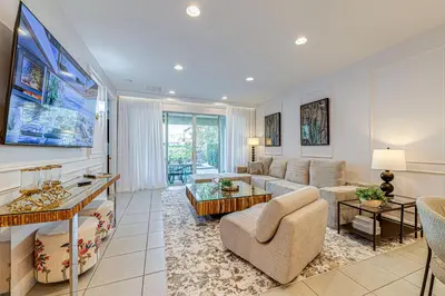 a living room with a couch and a table at ECR7609 - 6B Enchanted Vacation Home @Encore in Orlando