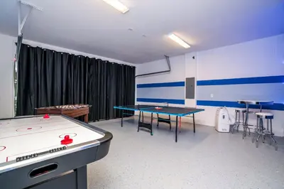 a ping pong room with a ping pong table at Ev1810 - Solara Galaxy Villa in Orlando