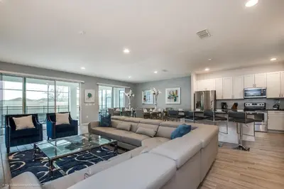 a large living room with a couch and a table at Ev2619 - Sonoma Retreat in Kissimmee