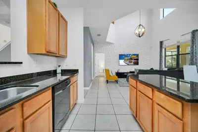 a kitchen with a sink and a counter top at Ev2628 - Veranda Palms Hideaway in Kissimmee