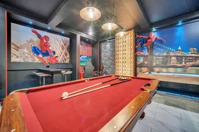 a pool table in a billiard room with at Ev2826 - Magical Horizon Villa in Kissimmee