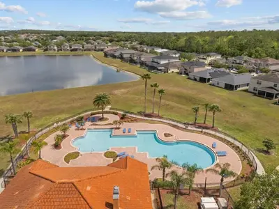 an aerial view of a pool at a resort at 4 Bed Close to Disney Private Pool in Kissimmee