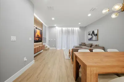 a living room with a couch and a table at NEW Cozy 2 Bedrooms2Baths At Encantada in Kissimmee