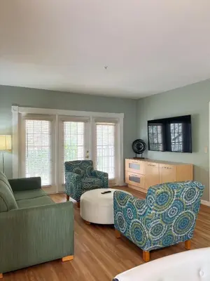 a living room with a couch and chairs at Star Island Resort and Club - Near Disney in Kissimmee
