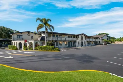 a rendering of a hotel with a parking lot at Quality Inn & Suites Altamonte Springs Orlando-North in Orlando