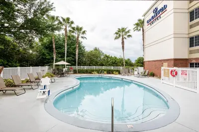 a swimming pool at the hampton inn suites anaheim resort at Candlewood Suites Lake Mary by IHG in Lake Mary
