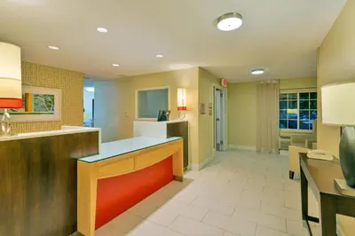 a large kitchen with an island in a room at MainStay Suites Orlando Altamonte Springs in Orlando