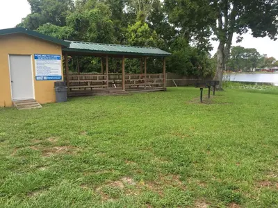 a gazebo in a park next to a lake at Budget Inn Sanford International Airport in Sanford