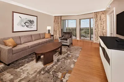 a living room with a couch and a table at Hilton Grand Vacations Club Parc Soleil Orlando in Orlando