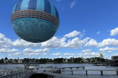 a hot air balloon flying over a body of water at Viz Cay 4816 in Orlando