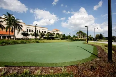 a golf course in front of a building at 5036 105 Viz Cay in Orlando
