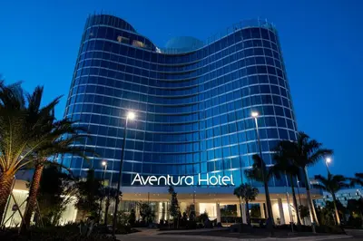 a large building with a sign on it at Universal's Aventura Hotel in Orlando