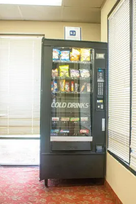a cocacola refrigerator in a room with food inside at Grand Lake & Lifetime of Vacations Resorts in Orlando