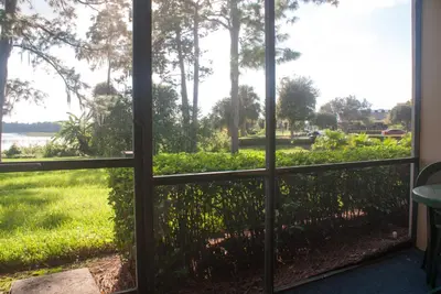 a view from a window of a garden at Grand Lake & Lifetime of Vacations Resorts in Orlando