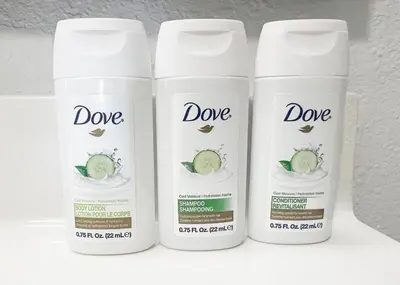 three bottles of dooe on a shelf at Baymont by Wyndham Orlando North Millenia in Orlando