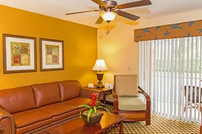a living room with a couch and a chair at Westgate Leisure Resort in Orlando
