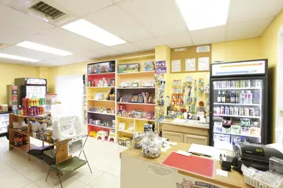 a store with a grocery store with at Orlando RV Resort in Orlando