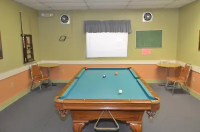 a billiard room with a pool table in it at Orlando RV Resort in Orlando