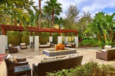 a patio with couches and chairs and a fire pit at The Westin Lake Mary, Orlando North in Lake Mary